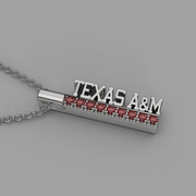 Horizontal view of the sterling silver TEXAS A&M garnet pendant on chain